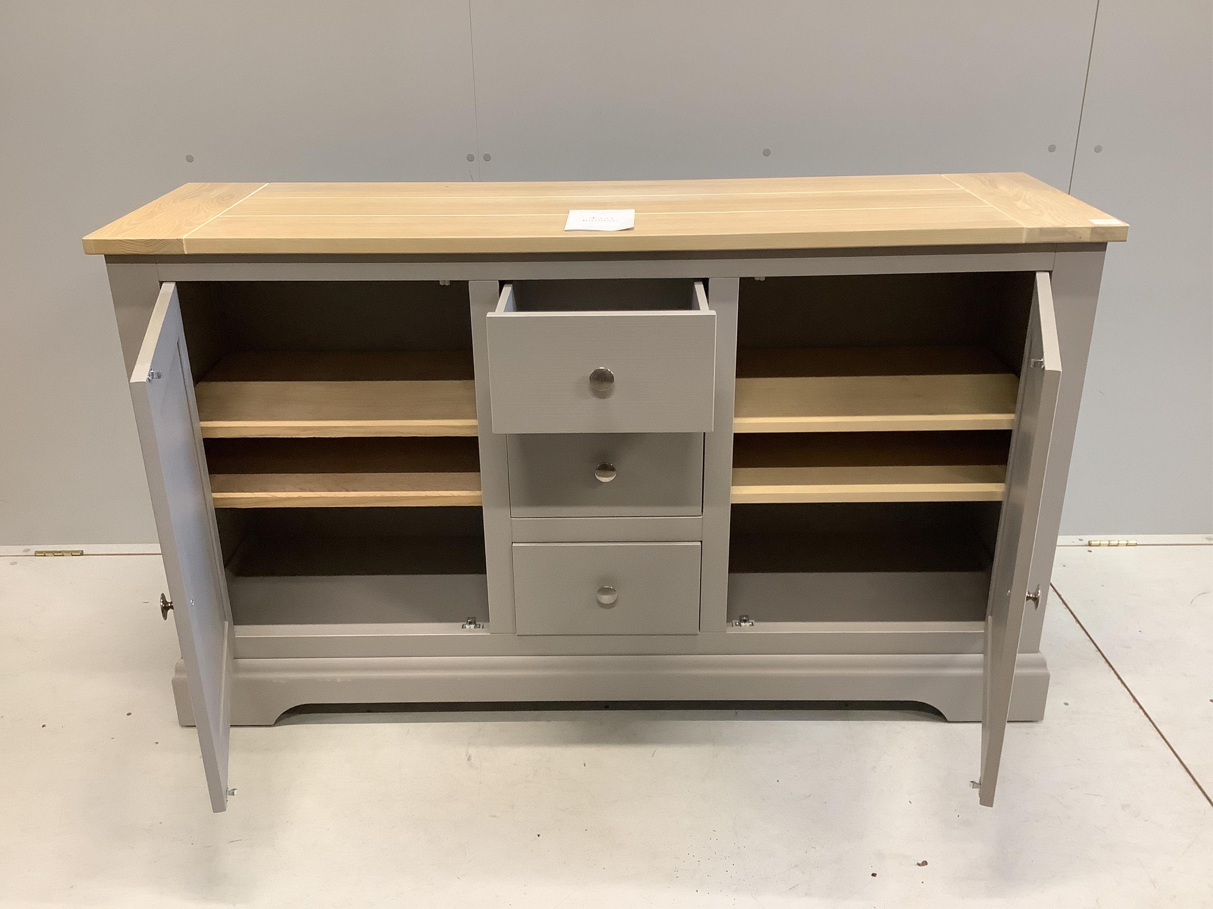 A Laura Ashley 'Dorset Furniture' painted sideboard, width 153cm, depth 45cm, height 89cm. Condition - good